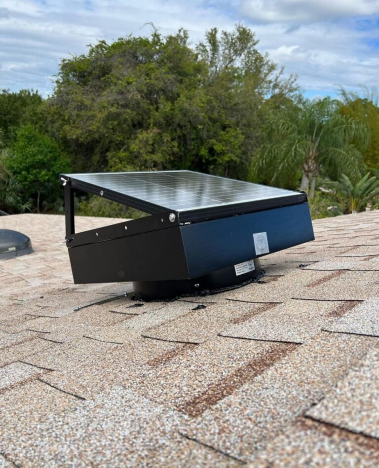 A solar attic fan mounted on a roof